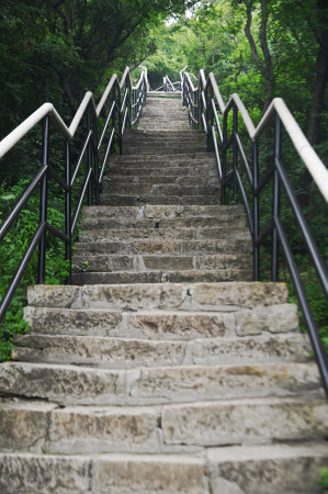 Stone staircase on ground in Yuntaishan Park is the most beautiful geological park in Henan Province, China. It is listed as the first geological heritage site in the world.の写真素材
