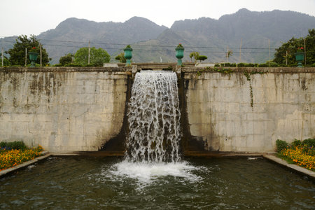 Waterfall in the Nishat  garden Bagh is a popular tourist attraction, Nishat Bagh is a 12-tiered terraced garden located near the famous Dal Lake in Srinagar.の写真素材