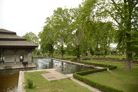 The buildings and ponds that decorate the Shalimar Bagh Gardens are a beautiful Mughal garden in Srinagar, Jammu and Kashmir, India.の写真素材