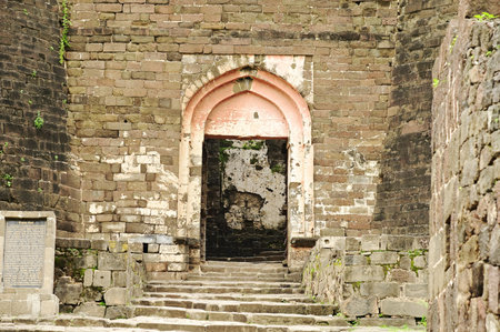 Classic arched entrance at Daulatabad Fort is an ancient fort located in Maharashtra, India. Originally named Deogiri, it is a fort built from natural rocks and is very strong.の写真素材