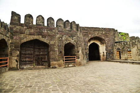 Classic arched entrance at Daulatabad Fort is an ancient fort located in Maharashtra, India. Originally named Deogiri, it is a fort built from natural rocks and is very strong.の写真素材