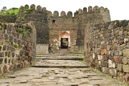 Classic arched entrance at Daulatabad Fort is an ancient fort located in Maharashtra, India. Originally named Deogiri, it is a fort built from natural rocks and is very strong.の写真素材