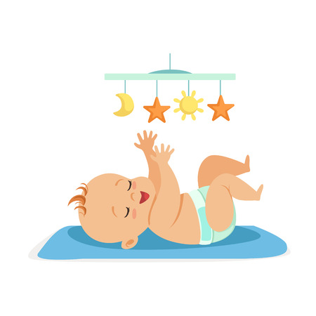 Cute naked baby in a diaper lying in bed and having fun with toy carousel, colorful cartoon character vector Illustration isolated on a white backgroundのイラスト素材