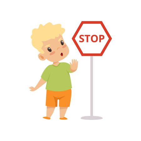 Cute Boy Showing Stop Gesture While Standing Next Warning Road Sign, Traffic Education, Rules, Safety of Kids in Traffic Vector Illustration on White Background.のイラスト素材