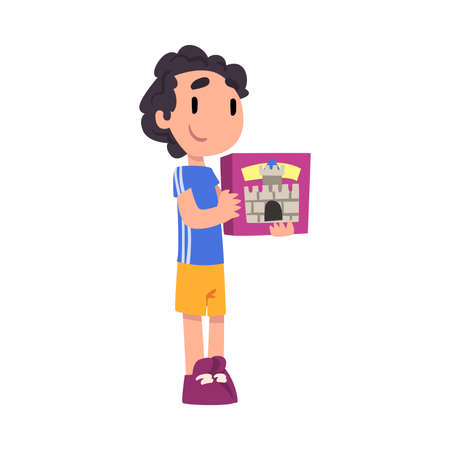 Cute Boy Holding Box of Blocks Constructor, Adorable Kid Playing with Favorite Toy Cartoon Vector Illustration on White Backgroundのイラスト素材