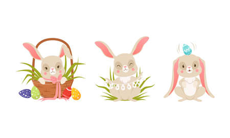 Cute Easter Bunny Sitting in Wicker Basket with Decorated Eggs and Holding Garland Vector Set