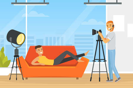 Young Man on Sofa Posing in Front of Photographer with Professional Camera Vector Illustrationのイラスト素材