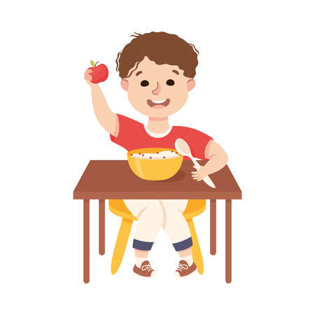 Little Boy at Kitchen Table Eating Porridge for Breakfast Engaged in Daily Activity and Everyday Routine Vector Illustrationのイラスト素材