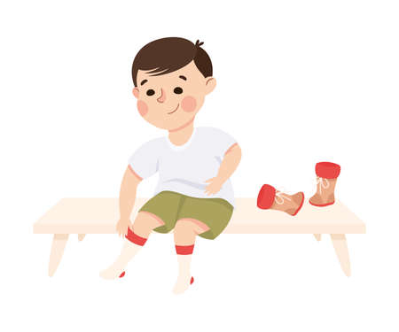 Little Boy Changing His Clothes Putting on Socks and Shoes Vector Illustrationのイラスト素材