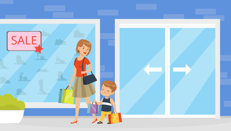 Polite little boy helping his mother to carry shopping bags with purchases. Well mannered kid, good manners and respect cartoon vectorのイラスト素材