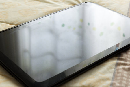 the labtop on the bedの写真素材