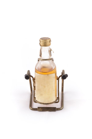 the isolated of the glass bottle with alcohol on white background in a studioの写真素材