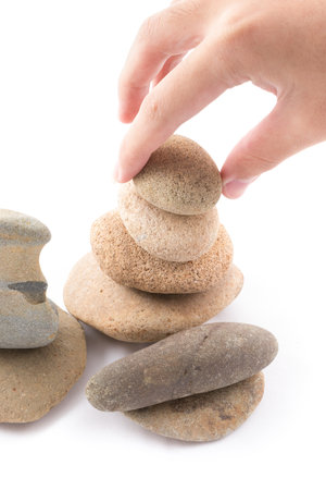 the isolated of the balance stones is zen for spa on white backgroundの写真素材