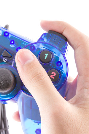 the isolated of the blue joystick for controller and play video game on white backgroundの写真素材