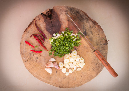 Vegetable and herb with chopping board for cookingの写真素材