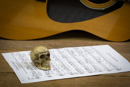 Still life art photography concept with skull and guitarの写真素材