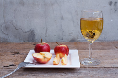 the apple and vine on wood tableの写真素材