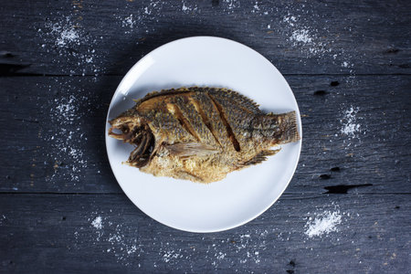 Deep Fried Tilapia Fish with salt, Top view.