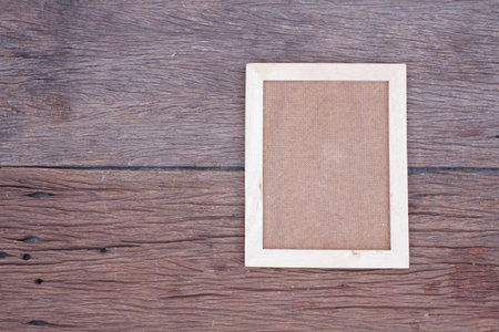 Blank wooden picture frame on wood table,interior design and copy space