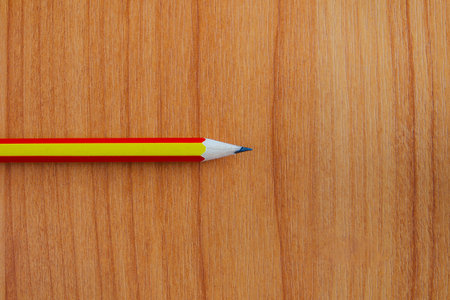 Colorful pencils on wooden backgroundの写真素材