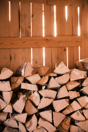 Firewood in the barn, stock for the winter.の写真素材