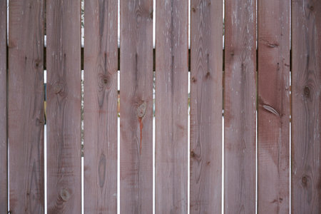 Old wooden fence background texture close upの写真素材