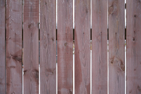 Old wooden fence background texture close upの写真素材