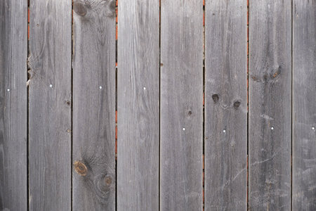 Old wooden fence background texture close upの写真素材