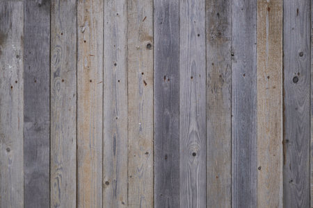Old wooden fence background texture close upの写真素材