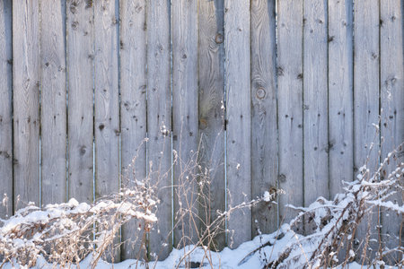 Old wooden fence background texture close upの写真素材