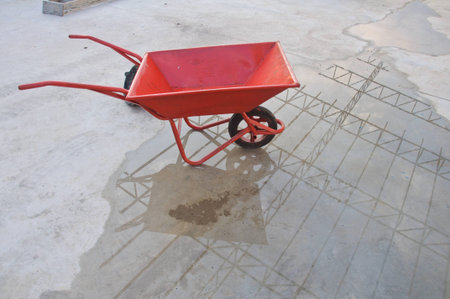 concrete wheel barrow for man powerの写真素材