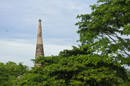 Top of ancient pagoda in ruined old temple at Wat Yai Chai Mongkol temple in Ayutthaya, Thailand の写真素材