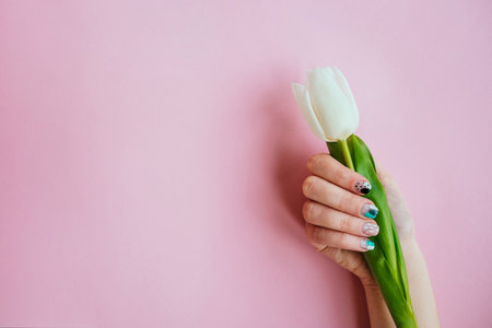 Spring manicure with tulipの写真素材