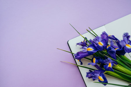 Notebook with violet flowers