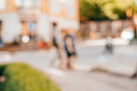 Blurred background with group of people walking outside.の写真素材