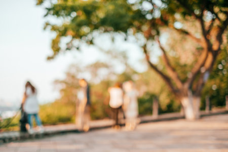 Blurred background with group of trees in the park.の写真素材