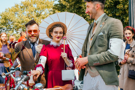 Kiev, Ukraine - May 12, 2018: Couple in vintage clothes participating in bicycle tweed run Retro cruise on May 12, 2018 in Kiev, Ukraine.のeditorial素材