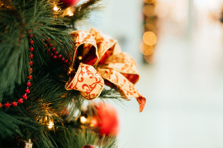 Background with Christmas tree decoration and gold garland.の写真素材