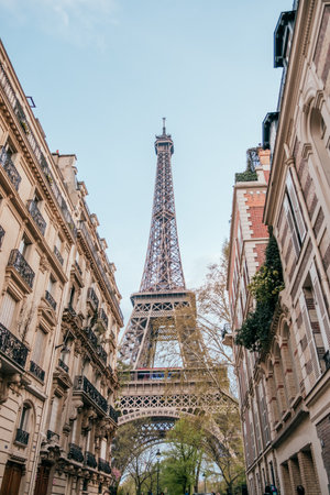 Paris, France - April 6, 2019: beautiful streets of Paris with the view on Eiffel Tower.のeditorial素材