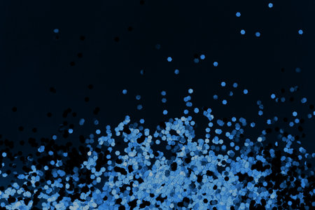 Silver glitter isolated on blue background. Christmas holiday concept.の写真素材