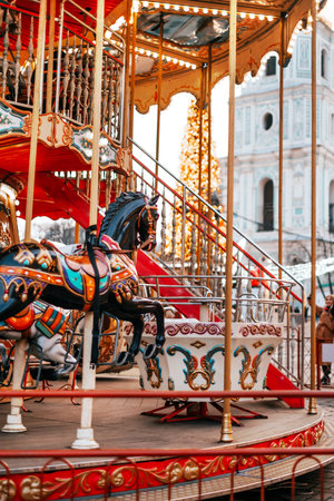 Kyiv, Ukraine - December 25, 2018: retro carousel at the Christmas fair at St. Sofia Square in Kyiv.のeditorial素材