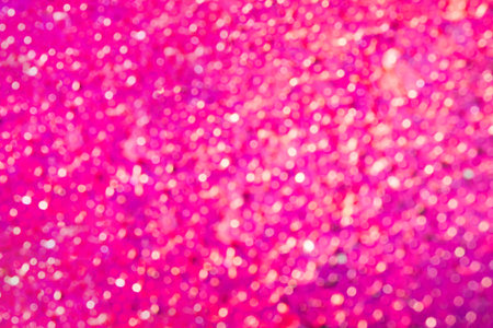 Abstract background with magenta glitter bokeh lights.の写真素材