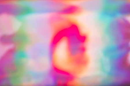 Multi colored background with holographic texture effect.の写真素材