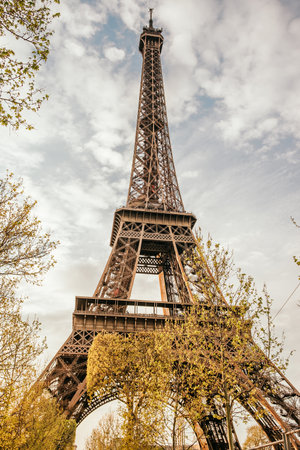 Paris, France - April 6, 2019: beautiful streets of Paris with the view on Eiffel Tower.のeditorial素材