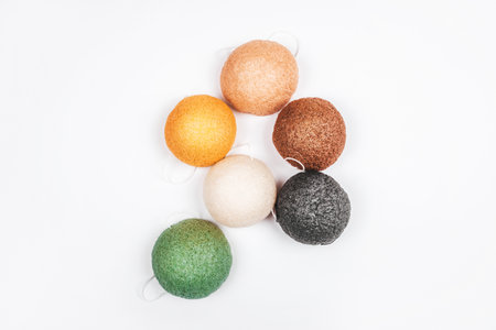 Flatlay with colorful konjac sponges isolated on white background. Zero waste concept.の写真素材