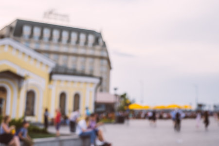 Blurred background with people walking on the street.の写真素材
