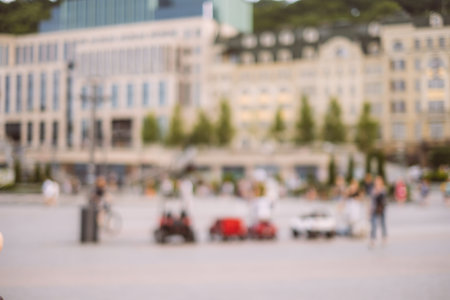 Blurred background with people walking on the street.の写真素材