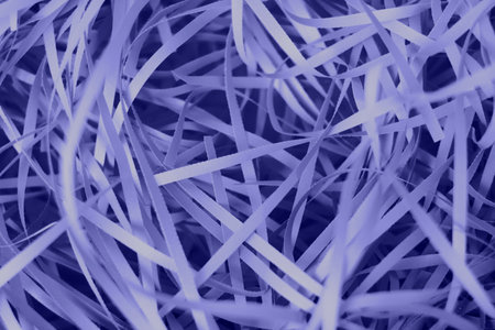 Close up photo of shredded violet paper strips.の写真素材