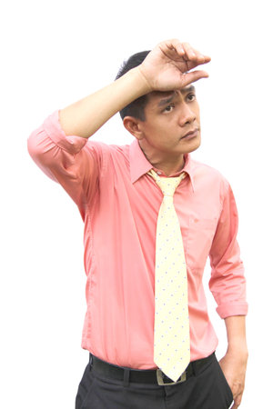 Serious man in white backgroundの写真素材