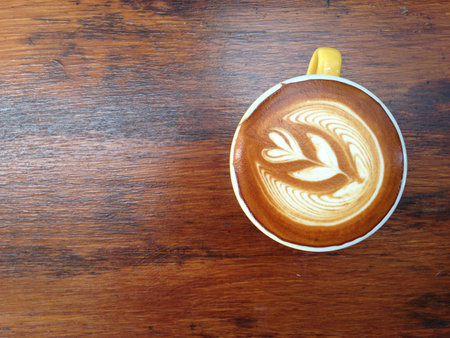 A cup of coffee and copy space on wood backgroundの写真素材
